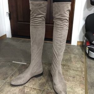 Over-the-knee suede boots.